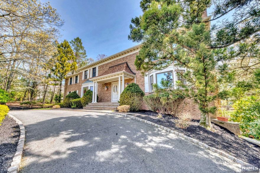 Magnificent Colonial of 6700 sqft is set on a flat one acre in prestigious High Woods Gate of Urban Farms. The fantastic two story entry foyer opens up to a grand sized living room with FPL. Beautiful custom Salerno kitchen is connected with vaulted ceiling family room with Fpl and french doors leading to Mahogany paneled great room with wet bar and FPL. This home is perfect for entertainment and everyday life. Beautiful backyard offers in-ground pool and pool house with kitchenette and full bathroom. 6 bedrooms,6.5 bathrooms, 5 fireplaces,3 car garage, finished basement, circular driveway and much more...