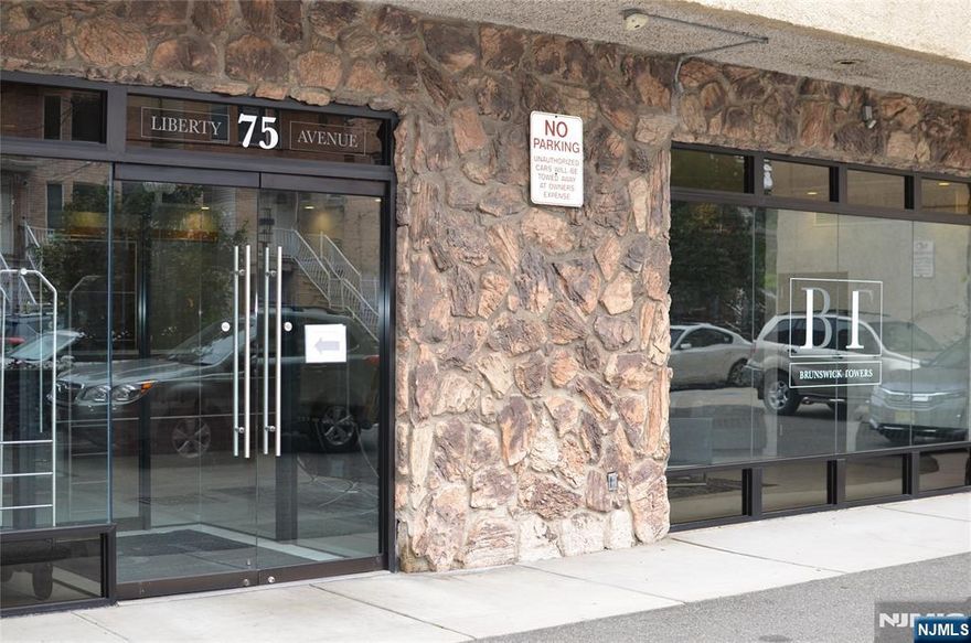 Investor's delight, MOTIVATED SELLER, highly sought-after 2-bedroom, 2nd floor condo unit for sale at The Brunswick Tower. This is one of those rare units that features true loft style 14 ft high ceilings. The unit has a washer & dryer, central heating & cooling, a microwave & dishwasher. The property features private parking, gym, swimming pool, kids' ground area, and an outside BBQ grill. This elevator building comes with a 24-hour concierge. All just a short walk to the PATH Train Station & the 125 bus on Kennedy Blvd that takes you into Midtown NYC Port Authority. Be neighbors with Mana Contemporary Museum. This area has become very attractive due to its proximity to NYC. A must See!!!