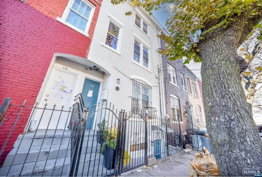 Sensational opportunity to own this triplex multi-unit brick row home sitting on one way street - North Newark Location 1 block from Branch Brook known for their precious Cherry Blossoms - Low maintenance yard space - Total monthly rents can equal 1% of purchase price - great investment available - Location applies for: Community Advantage Program; Super low rates in 4% range with only 5% down payment CONV, NO PMI!!