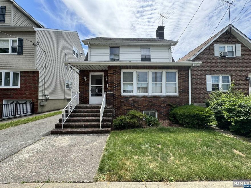 Charming oversized colonial on quiet dead end street in desirable Bloomfield loaded with potential. On the main level, you will surely love the generous living spaces, bright sunroom, and the old world charm including arched doorways, original hardwood floors, brick wood burning fireplace and stained glass windows. The second floor features 3 bedrooms and a large full bath. There are two finished rooms in the attic (one was used as a bedroom). The basement is finished and has washer/dryer hookups and toilet. Long driveway with plenty of parking and a 2 car garage with a new door. This home is a blank slate just waiting for you to make your own. Don't miss out on this exciting opportunity!
