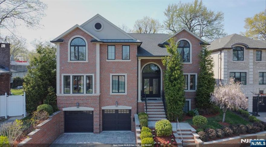 A Rare Opportunity to Own on Fort Leeâ€™s Most Iconic Boulevard Welcome to 1295 Abbott Boulevardâ€”an address synonymous with prestige, privacy, and timeless sophistication. This east-facing, newer 5-bedroom, 4.5-bath custom colonial is nestled along one of Fort Leeâ€™s most celebrated residential corridors. Just minutes from Manhattan, top-rated schools, scenic parks, and the areaâ€™s best dining and shopping, this home offers an extraordinary lifestyle for those who value elegance and convenience. From the moment you step into the grand double-height foyer, youâ€™re surrounded by a sense of scale, craftsmanship, and refinement. A sweeping staircase and soaring ceilings make a stunning first impression, while warm designer finishes throughout lend a welcoming, contemporary feel. At the heart of the home lies a state-of-the-art chefâ€™s kitchen featuring Thermador appliances, a double oven, quartzite countertops, a dramatic 6-inch marble waterfall island, a self-opening refrigerator, a wine fridge, and a dishwasher. The space flows effortlessly into a generous family room with a custom gas fireplace and built-in shelvingâ€”ideal for intimate evenings or upscale entertaining. Also on the main level is a splendid private office overlooking the garden, offering a peaceful, sunlit space to work or unwind. Upstairs, the primary suite is a private sanctuary, complete with a cozy fireplace, dual walk-in closets, and a spa-inspired bathroom featuring radiant heated floors, a soaking