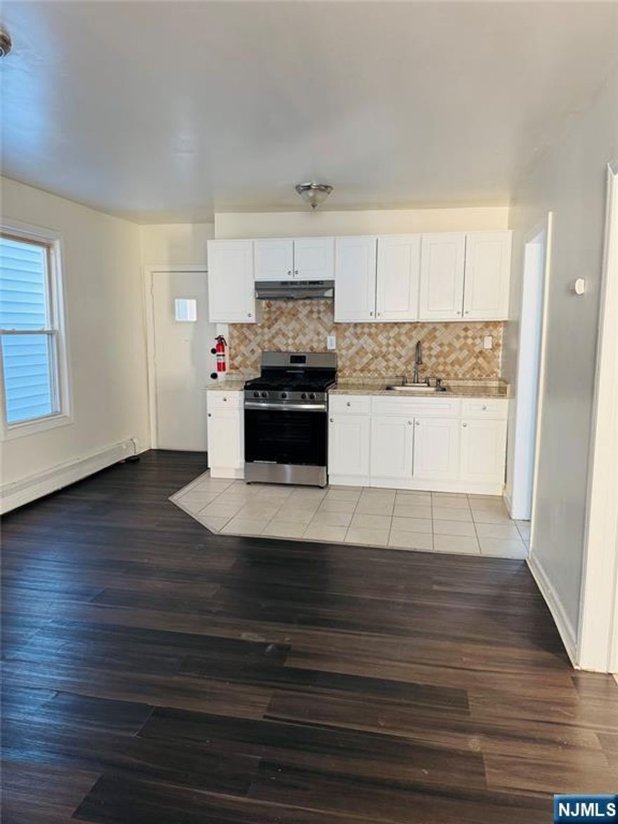 Welcome to this fully renovated four-bedroom apartment featuring two floors of thoughtfully designed living space. The home offers stylish upgrades throughout, including modern finishes, updated kitchen and baths, and spacious bedrooms filled with natural light. The two-level layout creates a comfortable flow and added privacy, or shared living.