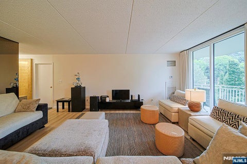Photo of 1077 River Rd #413, Edgewater, NJ 07020 (MLS # 26031990)