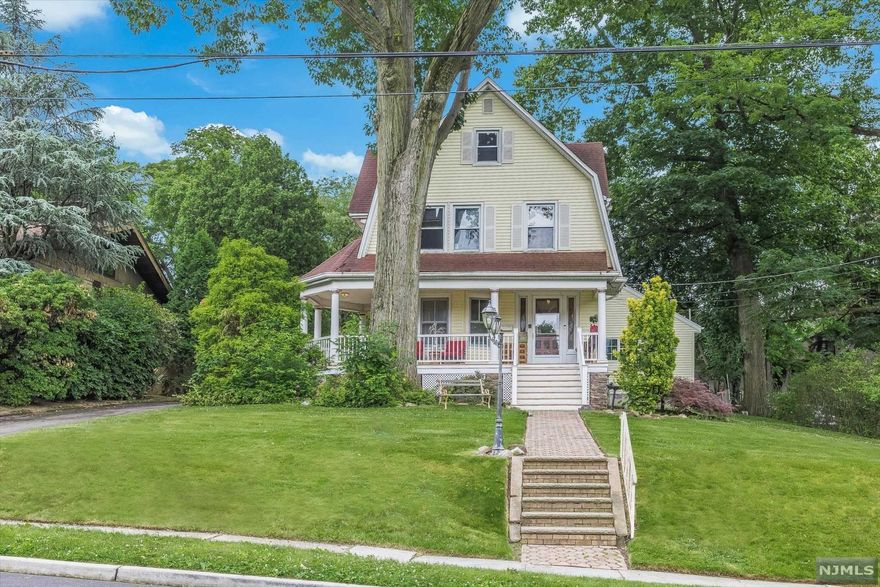 Stately Victorian with wonderful curb appeal located in the Yantecaw section of town, steps away from Nutley's park system. Enjoy early morning coffee or evening refreshments on open front porch. Enter into gracious foyer/gentleman's parlor and generous sized living room. Adjacent is a formal dining room with small office alcove. Outstanding open-concept kitchen/great room conveniently located to entertain large gatherings. The kitchen island offers plenty of seating, overlooking stone faced fireplace, in-home bar, and sizeable dining area. Additional first floor rooms include mudroom and powder room. For three seasons, enjoy the amazing outdoor, covered deck, complete with electric and outdoor grilling system and lighting. Wow, you must see this space to believe it could be in your backyard! Second floor offers master bedroom with raised sitting area, oversized shower, well-lit make-up vanity and farm door leading into big closet. Two more generous sized bedrooms and full bath in