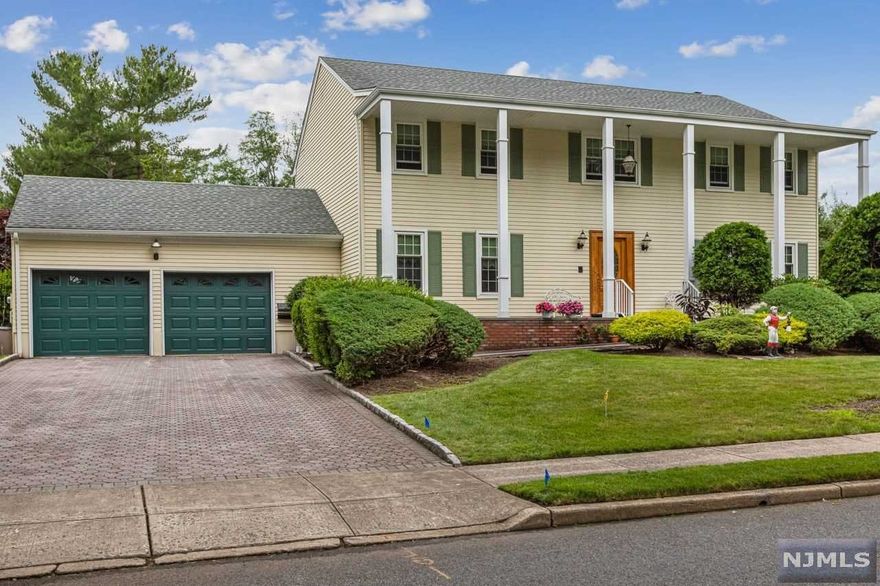 Beautiful 4BRS/3.5FBTH Center Hall Colonial sitting on a large lot close to Paramus Swimming Pool, Midland Elementary School and Paramus Branch Library.Kitchen was redone(2015) with Granite countertop,center Island,Ceramic tile floor in Kitchen, newer appliances,newer window treatments(2019),Formal Dining Room,Family room with fireplace, Laundry room next to Kitchen, door to large patio.All Hardwood floor thruout, 2nd floor has nice size of 4brs/2fbth. Full Finished basement with extra room,full bathroom, large wetbar with sitting chairs,newer AC unite(2yrs).