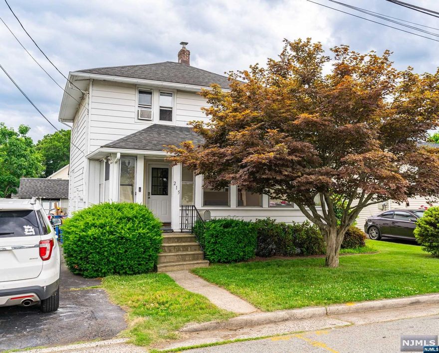 You must see this one! This charming, totally refreshed colonial with original architectural details and mature landscaping offers generous spaces in a quiet + convenient neighborhood just minutes from NYC trains, shopping, dining, parks, + more. Bright and airy eat-in kitchen with newer appliances and flooring, plus a pantry! Fresh and clean living spaces with modernized flooring and paint flow into a cozy den + sunny enclosed porches ready for entertaining or relaxing. Three comfy bedrooms and a glamorous bathroom featuring a double vanity, walk-in shower + linen storage round out the upstairs. Finish your tour in the welcoming rear yard, patio, garden + shed, plus a full basement with side-entrance, loads of extra space + updated mechanicals. Come make this house a home before someone else does!