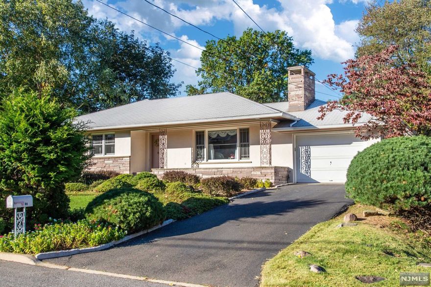 Extremely well built home inside and out with many custom features and above average construction. Original owner purchased adjoining lot after house built and combined to form one Large lot. Outbuilding has excellent storage or potential use for Hobbyist. Great Location. Great opportunity for someone looking to build a much larger home or for someone looking for a large lot. Basement is huge and offers loads of potential to finish. Garage has a pass through door and there is additional parking area in back.