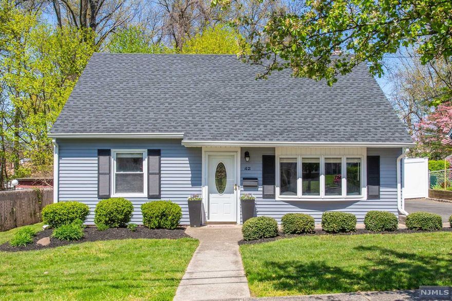 Looking for a great neighborhood? Look no further...This sun-filled 7 room, 4 bedrm, 2 FBA exp.cape has been well maintained & boasts many recent updates. Tastefully renovated in the last 5 yrs,this home features a large LR, an updated EIK with granite CT,recessed lights, Samsung SS('19) appliances w/ walk in pantry, a laundry rm with new W/D('20),a great rm/dining rm w vaulted ceiling with access to the level,fenced yard, plus there are 2 bedrms & a updated FBA('19) on the main level.The 2nd flr feature 2 bdrms, an updated FBA & a spacious storage rm.Other recent updates/features of this home inc: a 6' white PVC privacy fence('17), ext.paint('17), the graded & sealed driveway('19), new roof('19), vinyl plank laminate flr('20), updated landscaping & seeded lawn('21), new gas HWH('21) & front & back patios. Versatile floorplan. This is a wonderful home for entertaining. Convenient to shopping, schools, NYC bus & trains & vibrant Upper Montclair. Make this your new home this summer!