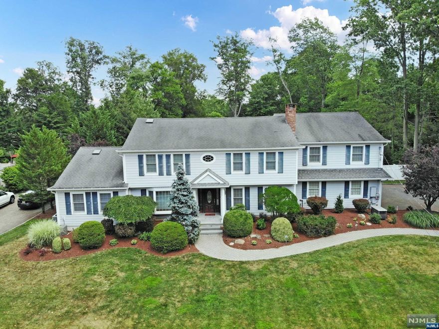 LOCATION, LOCATION, LOCATION! This is it this home offers it all, location, deep property, 3 car garage, newer additions, and in-law suite. The home was gutted to studs and 3 additions added: newer exterior, interior, plumbing, room, electrical, additions. Master bedroom suite, family room, 3 car heated garage, sprinkler system, professional landscape lighting, 2nd floor hallway was reconstructed to larger foyer. French doors leading to private master bedroom suite, step up 5th bedroom or private office overlooking beautiful deep private yard. Second floor bedrooms all have WICS. Hardy plank exterior. New pool and pool house.