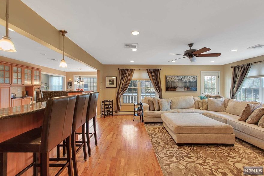 Welcome to this outstanding, updated, expanded & renovated Colonial set on a rarely found 218 deep, flat & magnificent property..This exceptional home is located on the Quiet side of Hillsdale Ave (on the border of River Vale), set back from the road, with long private driveway. So many incredible & innovative updates! Enter the Formal Living Room w/Hardwood floors & stunning Fireplace, the focal point of this spacious & inviting Room. Open flow is the key to the design of the Dining Room, Kitchen & FR Addition! Magnificent Updated Kitchen w/ Breakfast Bar, Granite Counters & Stainless Appliances opens to Family Room addition & the Dining Room, overlooking the patio, new deck, & huge, flat & remarkable rear yard. Immense Cath Ceil Primary Suite/PrimaryBth! Main Level 4th BR & Bth (Guest RM) Finished Lower Lev..Separate Artist's Studio in Rear (Your hideaway). Minutes from Town Center w/fine Restaurants & NYC Bus & Rail. Top Rated Schools..Incredible Life Style..Stunning Home!