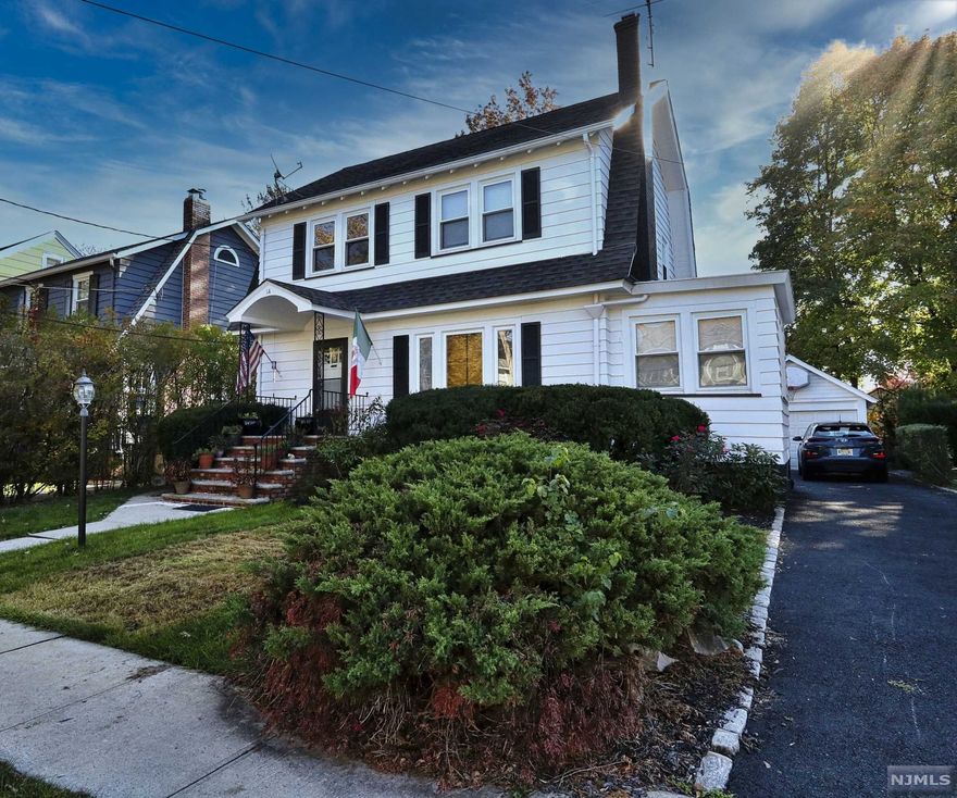 This charming colonial, with a large deck and above ground pool, is a must see. You'll make it through the front door to find a nice size living room with a fireplace and new flooring throughout. The living room leads you into the dining room and the spacious renovated kitchen. In the kitchen you'll find plenty of cabinet space and right off of it there's a mud room the leads to the deck. The first floor is completed by an additional room that could be used as a home office. The second floor features three bedrooms, all recently painted. The home also features a large walk-up attic, and a fully finished basement. This comfortable colonial also features two bathrooms.