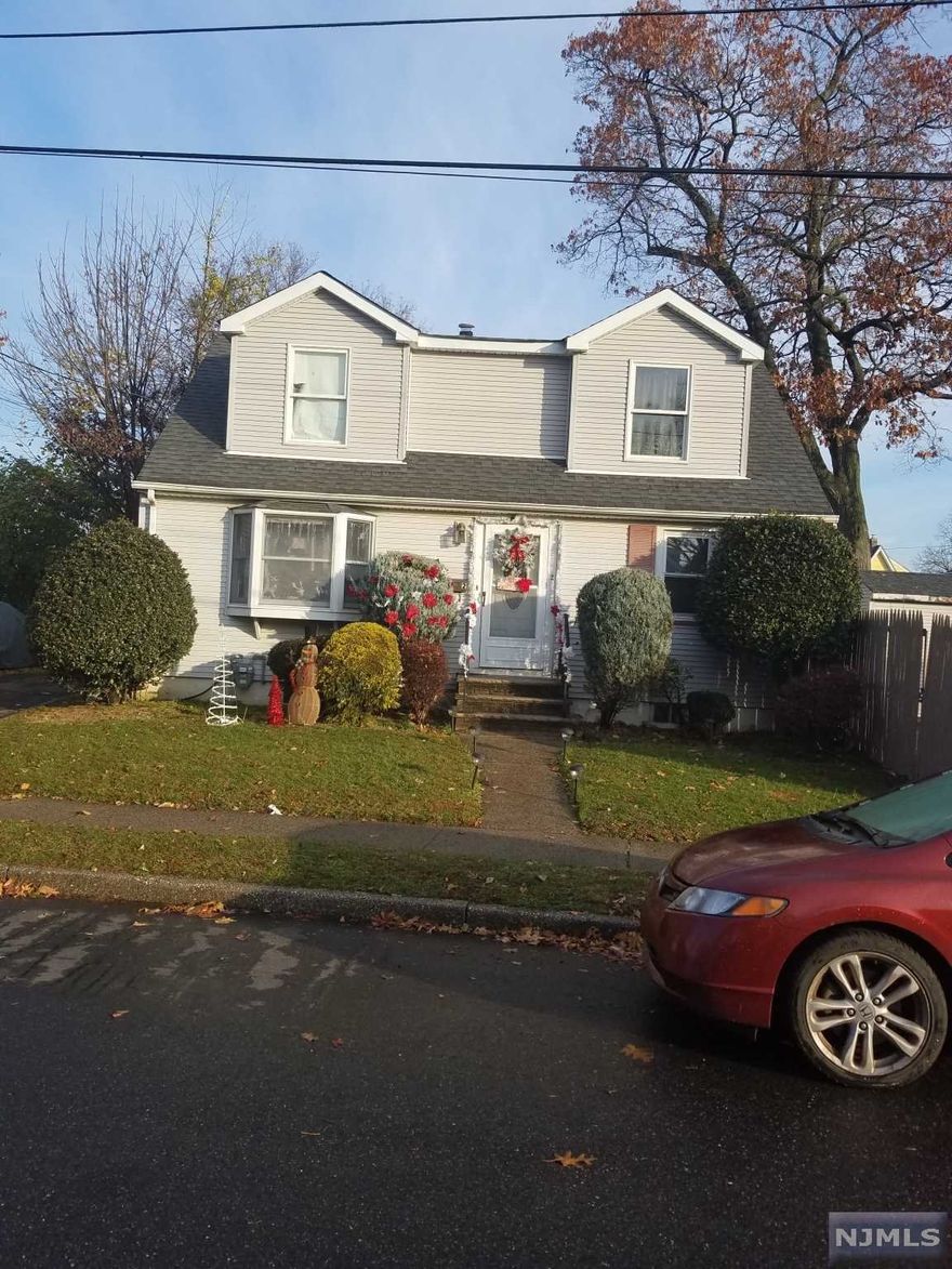 Investors dream full occupied two family home , 2 bed rm 1st floor 1 bed rm 2nd floor tenant pay utilities , close to Demerest school , close to stores , highway and ny buses.