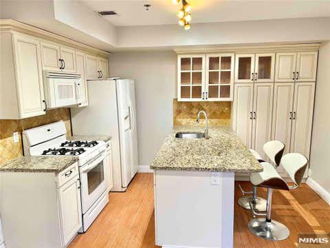 Photo of 284 John St #1, Cliffside Park, NJ 07010 (MLS # 26030874)