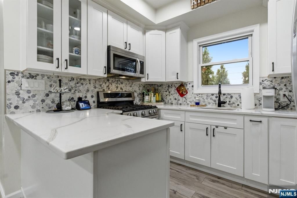 Photo of 103 Rutherford Place, North Arlington, NJ 07031 (MLS # 26008590)