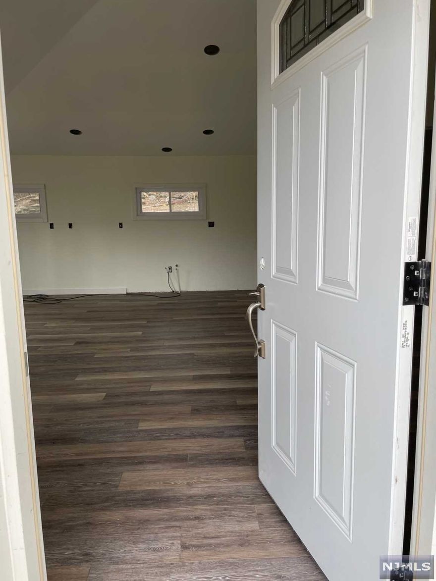 Lake community house completely gutted to the studs. This two bedroom ranch is ready for creative design of your own style could be a five room and 2 bedroom ranch with eat in kitchen. This ranch has a large deck for beautiful views.