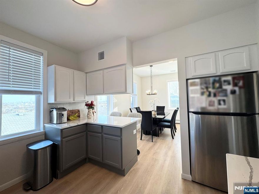 Newly renovated three-bedroom apartment featuring a modern kitchen with stainless appliances and granite countertops. Spacious living room with custom built-ins offers both style and functionality. This immaculate unit has hot water, baseboard heat, and central air for year round comfort. Best of all, enjoy stunning New York City views. A must see rental.