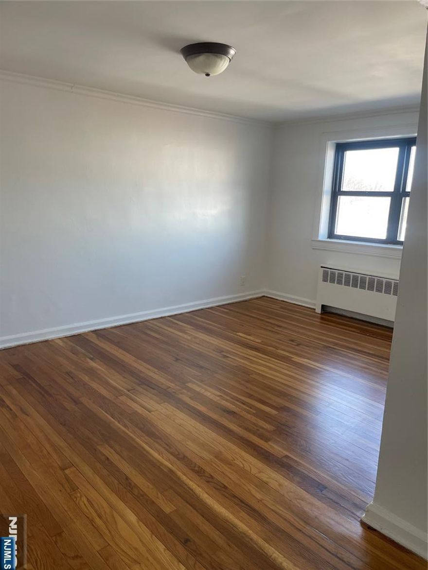 Welcome to your new home at D6, 2 Bedrooms, 1 Bathroom - this property is move in ready and has been painted, hardwood floor thorough out and all have been painted, Kitchen was updated a couple of years ago, Parking assigned. This perfectly located apartment near parks, shopping, downtown and playground area. There is a requirement of 3:1 income to debt ratio, a $300 non-refundable application fee, and a $250 move in/move out fee. Board approval is required