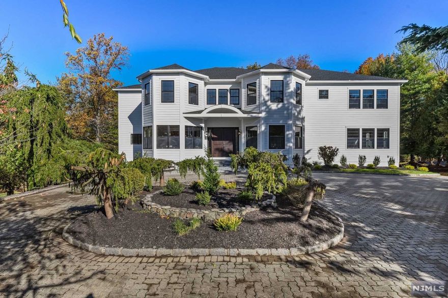 Stunning custom built 7BR/6.5BA colonial with 10300 sq ft of living space set on .63 acre lot in Laurel Hills section, Multi million dollar neighborhood ! This home boasts spacious open floor plan, 1st floor in-law suite and Study Room, Livingroom, family room and formal dining room, Game Room, Second Kitchen, The kitchen is complete w high-end SS appliances, center island ,quartz counters, custom cabinets. The 2nd floor is home to 5 impressive huge bedrooms, luxurious master suite , 2nd bedroom has its own en-suite, Loft, laundry. Fully finished walk-out basement with 10' ft ceilings, Mud room, Media room, Rec room, 7th bedroom and Full bath. Elevator.