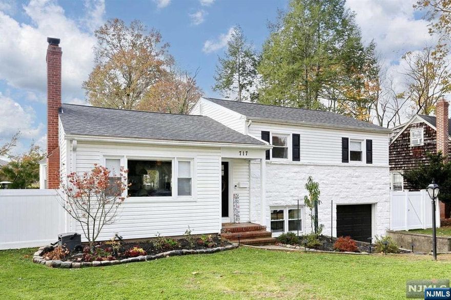 Welcome to this beautifully updated split-level home in desirable Oradell! Featuring 3 spacious bedrooms, 2 updated baths, and a bright, open-concept layout, this home is designed with today's family in mind. Step into the inviting living room that flows effortlessly into an updated kitchen with sleek finishes, and separate dining area perfect for entertaining or everyday living. This home has been enhanced with many recent improvements, including new central air, a new roof, a new fence for privacy,and a stone patio for outdoor gatherings. With nothing left to do, you can simply move in and enjoy! Families will love the convenience of this location. All three local schools, beautiful parks and downtown shopping are in close proximity and NYC-bound train and buses are nearby for an easy commute. With top-rated schools and a welcoming community, this home offers an exceptional lifestyle for young families. This is the one!