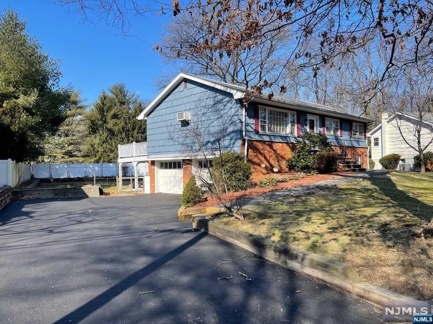 This home is ready for new owners to enjoy the Glen Rock Community. Situated on a cul de sac and located within walking distance to town center. Bergen line located in the rear of the property. Vinyl fence in rear yard. Spacious open floor plan with hardwood floors under the carpet. New trex deck, new driveway, new high efficiency boiler and hot water tank. Roof approximately 10 years old Fenced in yard. 2 car built in garage. Finished walk out basement with family room, laundry room and storage.