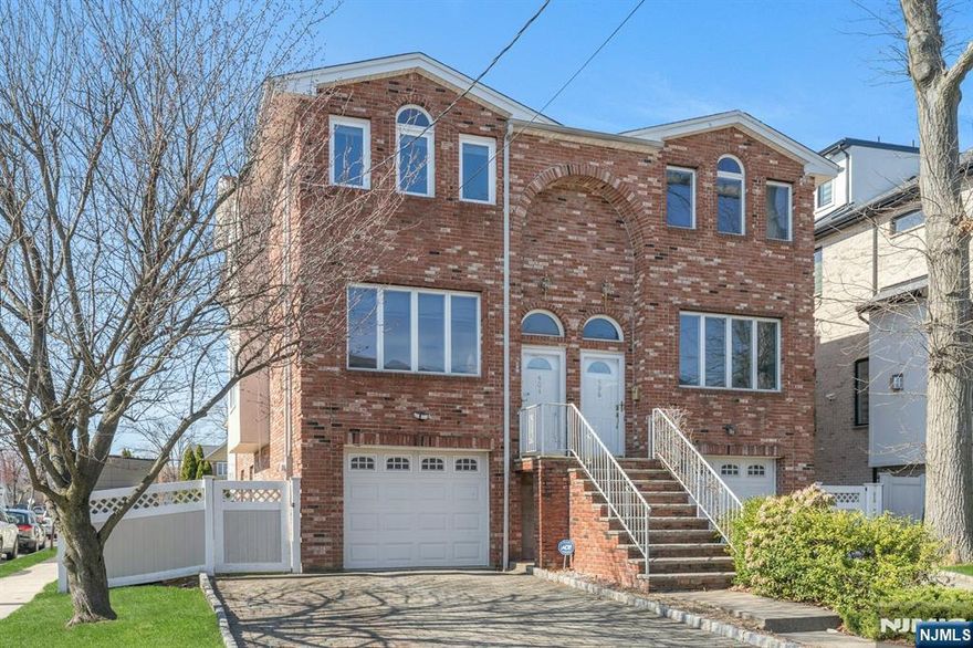 This bright and airy all-brick duplex offers 3 bedrooms, 3.5 baths, and a premium location within walking distance to Anderson Aveâ€™s downtown center. Freshly painted and filled with natural light, the home features skylights in the hallway and full bath. The newly renovated primary bath boasts brand-new fixtures and a walk-in shower, while new second-floor windows come with a lifetime warranty. Vaulted ceilings in the primary and third bedrooms add elegance. The kitchen offers granite counters, a breakfast area with access to a deck. The ground level includes a family room with new floors, full bathroom and a walkout patio. Enjoy a fenced yard with a fire pit, a mature plum tree, and space for BBQs. Three-zone heating and a central vacuum. walk in distance to an NYC-bound bus, this home is close to shops, restaurants, playgrounds and much more! Best & Final due on Wednesday 4/5 @ 5PM