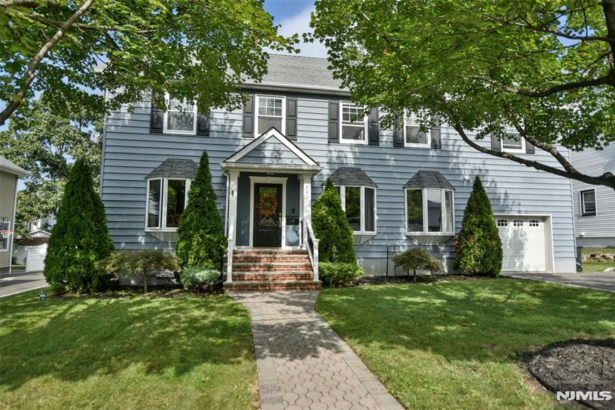 Big Bright and Beautiful Colonial situated on oversized parklike grounds in desirable neighborhood. LR & FDR boasts Luxury Vinyl plank floors with cork bottom that is mold, water and scratch resistant. DR and Modern Kitchen offer open concept: Kit incl: All Stainless Steel appliances (except range), Granite Countertops, CT backsplash, newer oven/stove vent hood , Glazed Porcelain Tile floor(kick plate under sink for heat). Updated Roof, Alum Sided, Paver Walkway from front door, SGD from Kit out to Brand New Deck!! Second Flr: First Bed. has "floating floor" + closet, Primary Bed incl. 2 large windows, 2 closets.. Original Hardwood floors in 3 of 4 bedrooms. 2 full baths with ceramic tile (one has C/A), Huge Hall closet, Heavy Duty Washer Dryer (2 yrs young) included.