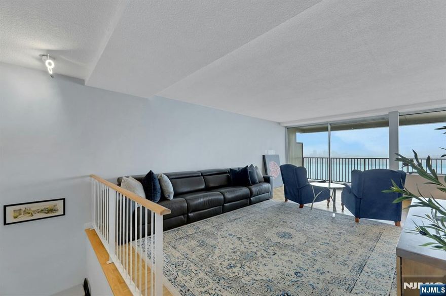 Discover unparalleled living in this magical two bedroom, two full bath duplex perched directly on the waterâ€™s edge, offering sweeping views of the George Washington Bridge, Hudson River, and the Manhattan skyline. Step outside to your expansive 24 foot riverfront terrace, ideal for enjoying open skies, shimmering water views, and fresh air. This home features a wraparound layout with east and west exposures across three levels, creating bright, open living spaces designed for entertaining. Enjoy generous storage throughout and a versatile guest bedroom with a barn door, allowing flexible use and direct connection to the primary suite. FEES ARE ALL INCLUSIVE $2,993.03 (maintenance $2,238.94, capital assessment $543.75, cable and internet $71.54, indoor valet parking $118.80 (#53), amenities $20). The community offers 24 hour doorman and security, community room, gym, two pools, two tennis courts, childrenâ€™s play areas, and an on site convenience store. Board approval required. 4:1 income to debt ratio. Gross income requirement for all cash buyers with no debt is $144k per year.