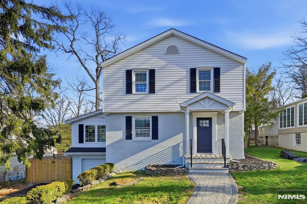 Photo of 30 W Lawn Road, Livingston, NJ 07039 (MLS # 25041348)