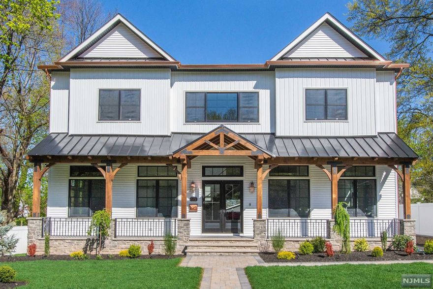 New construction modern farmhouse 6,200+ sq ft over 3 levels. Lrg entry doors & amazing floating staircase. Open floorplan w/12 ft ceilings, wide-plank HW flooring, LR, DR, & FR w/FP & 4 panel folding slider opens to huge wrap-around deck. dream kitchen has custom cabinetry w/ double pantry, massive island, quartz counters, smart faucets, high-end Wi-fi appliances w/ chef range & secondary undercounter refrigeration, 2 dishwashers, 2 sinks, & wine cooler. Office ensuite & rear mud RM. 2nd flr: 4 BR, 3 BA & laundry. All BRs w/custom WICs. MBR has vaulted ceilings, ceiling beams, FP. MBA: wet room w/soaking tub, multiple shower faucets, an oversized teak vanity w/ marble counters, heated floors & towel warmer. Finished bsmt w/wine room, gym, BR, BA, FR & dog wash. Huge yard w/patio, firepit, & outdoor kit. Deck features a rain drainage system! The 3-car detached garage w/ electric car charger. Near Brookdale Park, shops, restaurants, bus to NYC, train. A Rustic Appeal, LLC project.