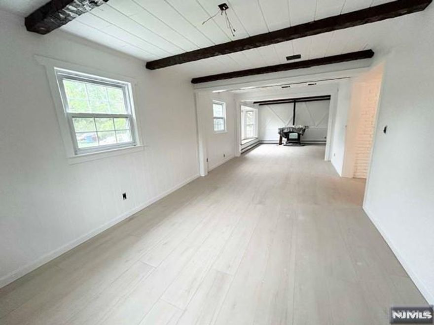 Beautifully kept custom-built house in prestigious town with top ranking school system, Tenafly. All radiant floor in 1st floor including bath and kitchen, 2nd floor and 1st floor living room baseboard. Newer central AC for whole house. 1FL: EF, Office/Dining, Kitchen, 1BR, 1BTH, Livingroom. 2FL: 4 BRs, 1BTH. Beautiful front and back yard with huge garage with work space. Tranquil neighborhood surrounded by big lots. Easy commute to NYC and major highways. One member of owner has NJ RE license. *** Pleasure to show.*** Beautiful maple hard wood floor and italian porcelain tiles done 2024, designer paint with benjamin moore.