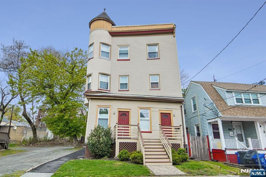 Exceptional investment opportunity in the heart of Montclair! 41 & 43 Mission Street are being offered together, presenting two adjacent lots. 41 Mission featuring a grandfathered three-unit property and 43 Mission along with a shared gravel parking area. All four units are currently tenant-occupied, generating approximately $107,000 in annual income, making this an ideal turnkey investment with immediate cash flow. The three-family at 41 Mission was fully gut renovated in 2022 and showcases modern upgrades throughout, including vinyl plank flooring, updated kitchen appliances, new plumbing and electrical systems, new windows, furnaces, hot water heaters, and the added convenience of a washer and dryer in the basement. The single-family home at 43 Mission offers additional income potential or future redevelopment flexibility. Zoned R2, this unique offering provides multiple paths for value creation. Investors may choose to maintain the current income stream by extending tenant leases or explore redevelopment opportunities, including converting the single-family to a two-family or reimagining both lots once leases expire. Ideally located near NYC direct train access, Glenfield School and Park, and Montclair's vibrant restaurant and shopping scene, this property combines strong income with long-term upside in a prime location. A 3D Matterport tour is available for virtual preview. Detailed expense information will be provided to qualified buyers upon request