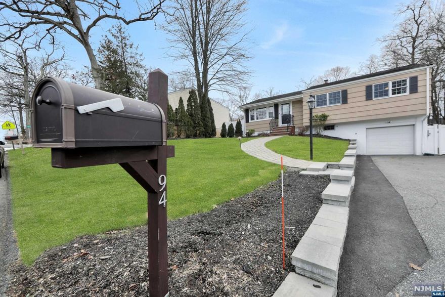 Hurry,as this one will not last!Impeccable Updated and immaculate 3 Bedroom Ranch in absolutely MINT CONDITION.Nothing to do except unpack and enjoy living in One of Bergen County's most sought after towns with top rated schools!Gleaming hard wood floors,spacious sun filled Living Rm w/ new electric FPL,Formal Dining Rm perfect for hosting large gatherings.Newly updated Kitchen w/stainless steel appliances, new Kitchen range,Granite counter tops and recessed lighting.All three bedrooms features double closets & organizers plus an updated full bathroom.Custom Oak staircase leads to light and bright finished walk out lower level & family room w/bar.Sliders open to huge, private fenced rear yard with a expansive paver patio.Additional features include central air,crown moldings,landscape lighting,paver block walk way and newly finished retaining wall.Septic (2017)Annual service contract paid through 2024..Easy access to schools, downtown and shopping!Make this your Home Sweet Home!