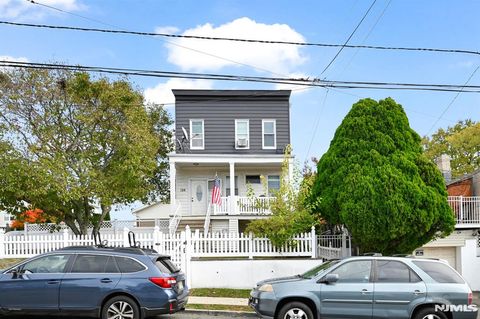 Photo of 126 Macarthur Avenue, Garfield, NJ 07026 (MLS # 25038185)