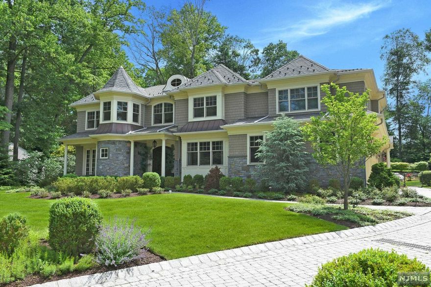 Stunning Custom home just 8 years young located in the prime East Hill of Upper Saddle River. This one of kind estate offers over 9K sq ft of luxury living including finished lower level. Grand 2 story entry foyer, opens to banquet sized DR, custom home office w/fp, built ins & coffered clg. Oversized dream kitchen w/large seated island, Wolf, Sub Zero and beverage station, breakfast area & sitting room w/FP. Fabulous great room w/extensive wood working, stone work & FP. 1st floor guest ste w/fl bath, priv entry & mudroom. 5 bedrooms ensuite, bonus 3rd level perfect for play room/yoga studio. Outdoor oasis with infinity style pool & spa, outdoor living room with wood burning fire place & kitchen. The lower level is fully equipped with a gym, home theatre, gaming room, bonus room & full bath. High ceilings, extensive trim work. 4 car heated garage w/lift & Tesla charger. Radnt heat, secrty cameras, sonos, gentr & water purif system.Your DREAM HOME!! MUST CLOSE END 6/22