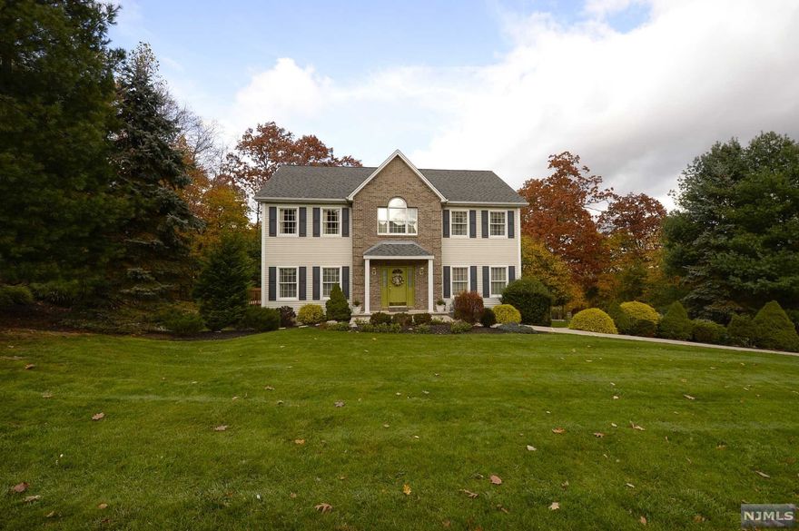 Immaculate move in ready 4 Brs, 3.5 Bth Classic Colonial on .52 acre of manicured property. Inviting entry foyer,formal dining rm,formal living rm,great rm w/gas fireplace/sliding french doors to deck. Gourmet Kitchen with custom maple cabinetry,corian countertops and granite center island. Upscale stainless steel appliances,GE profile stove/Kitchen Aid Wall Oven large walk in pantry a chef's delight plus a breakfast area! 2nd Floor features a spacious master br w/tray ceiling and custom walk in closet. Master Bth,Jacuzzi tub,shower stall,vanity w/dual sinks,3 additional bedrooms Main Bathroom shower over tub,double vanity,Large Laundry rm w/work sink. Finished walk out lower level has a full bth, sliding door to backyard. Extras: 2 zone Central Air ,5 zone hot water baseboard heat, security system,storage,central vacuum,3 car garage,whole house water filtration system,lawn sprinklers,totally redone driveway with granite Belgium block etc. A decorators delight pride of ownership!