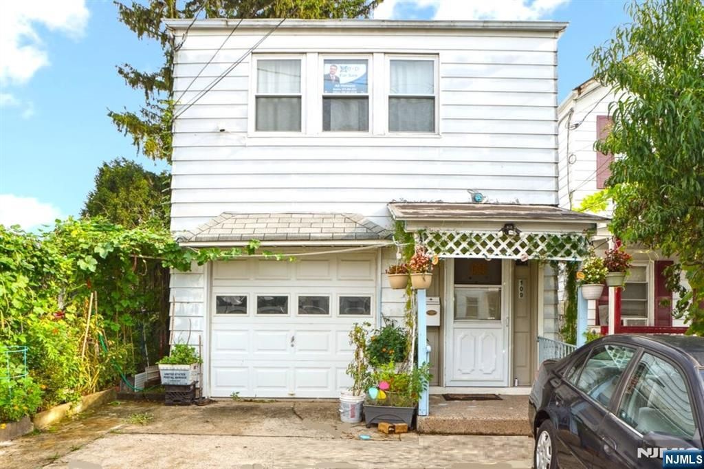 Photo of 109 Dixon Avenue, Paterson, NJ 07501 (MLS # 26008222)
