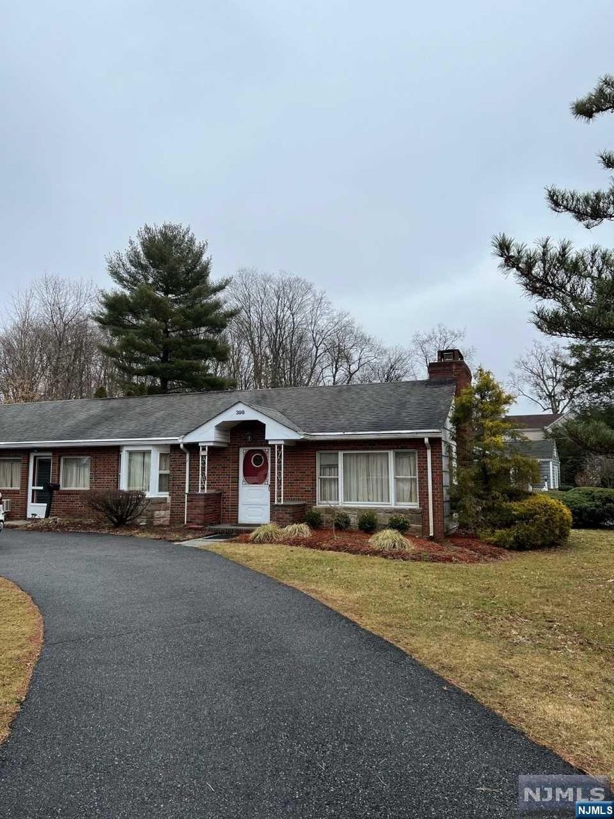 Great investment opportunity in primary Wyckoff location. Ranch style home with 2 bedrooms and 1 full bath. As you enter you will find an Office, there is a Stone fireplace in the Living Room. Circular driveway with 1 car attached garage on corner lot. 2 separate attics for additional storage space. Conveniently located to transportation, schools, shopping and so much more. Home being sold in "AS IS" condition.