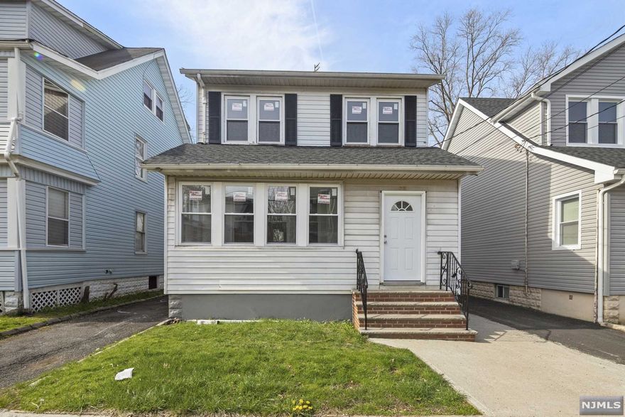 Wow! Totally renovated colonial featuring 3 brs, 2 baths and hardwood floors throughout. The spacious kitchen boasts beautiful cabinets, counters and floors. Stainless steel dishwasher, gas range, refrigerator and microwave. First floor also features a formal LR, DR and enclosed front porch, with tons of natural light throughout. Head to the 2nd floor, where you can enjoy 3 bedrooms and a full bath. The property also features a detached 2-car garage, with plenty of additional driveway parking. Full basement with bath and washer and dryer hook up. Enjoy the quiet neighborhood, located on a one-way street! Conveniently located to shopping, public transportation and easy to major highways. Low taxes... It won't last!