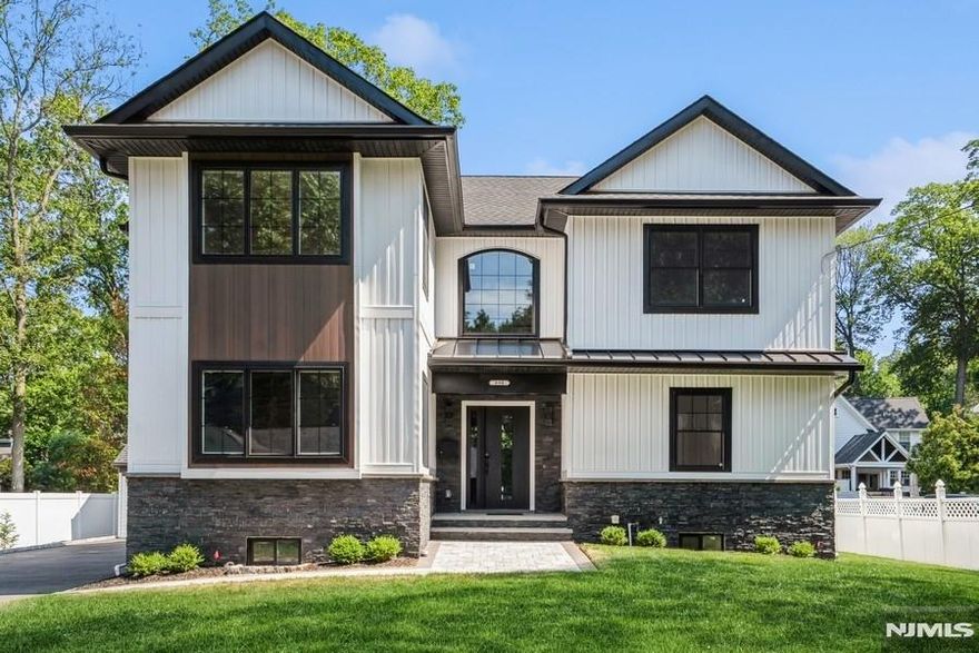 Stunning custom new construction on an existing foundation in highly desirable Oradell! This 5BR, 5BA home offers over 3,800 sq ft of luxurious living with 9-ft ceilings, oversized windows, and gorgeous hardwood floors throughout. The sunlit, open layout features a formal living room and dining room, as well as a spacious family room with sliders that lead to a custom deck and a beautifully landscaped backyard. The chefâ€™s kitchen dazzles with premium THOR appliances, quartz countertops, a striking backsplash, and a large center islandâ€”perfect for entertaining. The private primary suite boasts a tray ceiling, spa-inspired bath, and walk-in closet. Three additional bedrooms, a full laundry room, and a private first-floor in-law suite provide ideal flexibility for guests or relatives. The fully finished lower level offers versatile open spaceâ€”ideal for a gym, playroom, home office, or theaterâ€”plus a full bath. Featuring 2-zone HVAC, a 2-car detached garage, 8-car driveway, and close proximity to NYC trains, top-rated schools, shopping, and parksâ€”this exceptional home is a must-see!