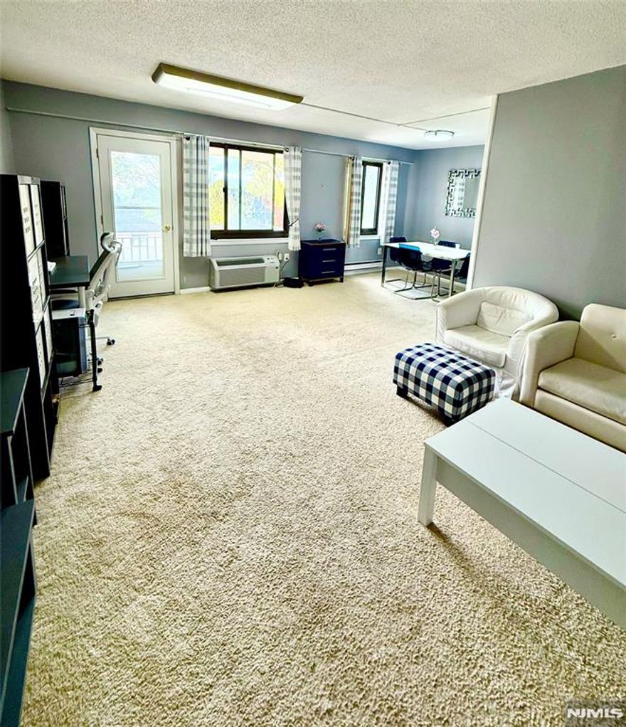 Come see this wonderful 1 Bedroom and 1 Bathroom at The Baridge House in Hackensack, on the very desirable Prospect Avenue! Bright and sunny condominium unit with a newly updated balcony overlooking the pool area, with a western exposure providing glorious natural lighting. Features include a welcoming entrance, spacious Living Room, options of Den and Dining area, newer electrical panel, and windows. Storage in Basement, and Laundry Room on the same floor. Building Amenities include a 24hr Concierge, Meeting Room, Pool, Gym, Sauna, and Visitor's Parking. Rare find of 2 Indoor Deeded Parking Spaces included. An easy commute NYC bus is nearby. Near parks, schools, and places of worship. Truly luxurious living. Hackensack is booming with new development, plenty of nearby shopping, a full range of dining experiences, leisure, and easy access to major roads and highways. Do not miss this amazing condo.