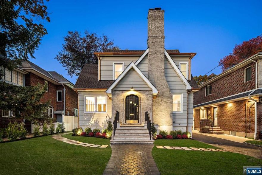 Call Listing Agent Ryan D'Errico +1(201)-988-4670 to see this Charming Home in Cliffside Park's most desirable neighborhood, blending modern updates and original charm. Restored original front door, marble entry foyer, newly refinished oak floors with decorative inlays. The inviting living room features a wood-burning fireplace with quartz surround. The Dining room opens to an island kitchen with a new GE deluxe appliance package, built-in dishwasher, high-powered range hood, and microwave plus a Sun drenched office with partial NYC views. Upstairs, find 3 bedrooms and a newly updated bathroom. The finished basement offers a full bath and separate laundry. The park-like backyard includes a new paver patio, walkway, sprinkler system, and a 2-car garage. Recent upgrades include brand new 2-zone central A/C, an ultra-efficient furnace, and a new hot water heater. Prime location on tree lined street steps from express NYC transportation and close to Ferry and NYC. Come take a look!