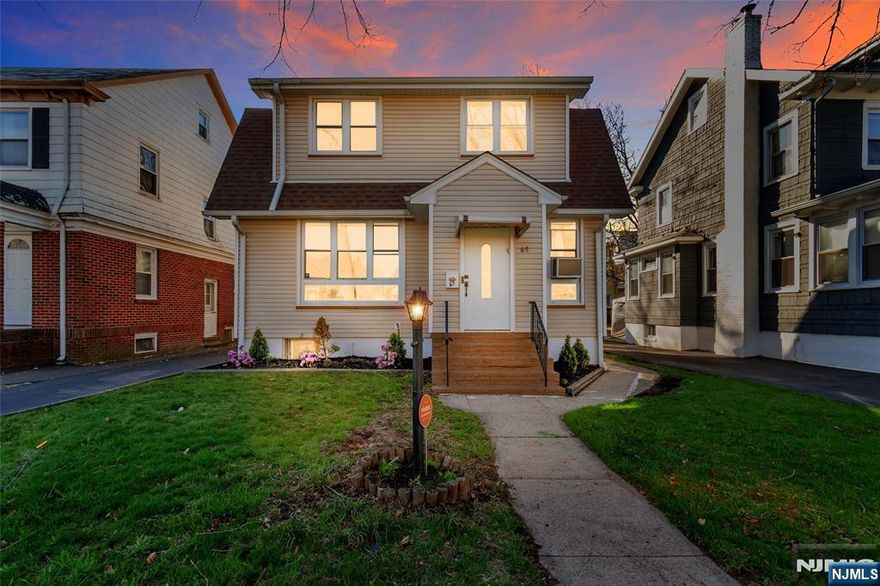 Step into this beautifully renovated Colonial that effortlessly combines timeless charm with modern updates. The main floor offers a spacious living room, an elegant dining room, primary bedroom. The newly designed fully renovated horseshoe kitchen kitchen is a chef's dream, featuring stainless steel appliances and luxurious quartz countertops, waterfall breakfast bar ideal for both everyday cooking and entertaining. Upstairs, you'll find 3 generously sized bedrooms and a tastefully fully, brand new full bath, offering comfort for the whole household. The fully finished basement with its own private entrance is a standout space, complete with a brand-new summer kitchen, cozy family room, and an additional full bath. It's perfect for gatherings, extended living, or guest accommodations. Outside you will enjoy a spacious backyard, ideal for outdoor activities and entertaining. Include a newer roof and siding, a freshly redone driveway with parking for three cars, and a backyard storage.