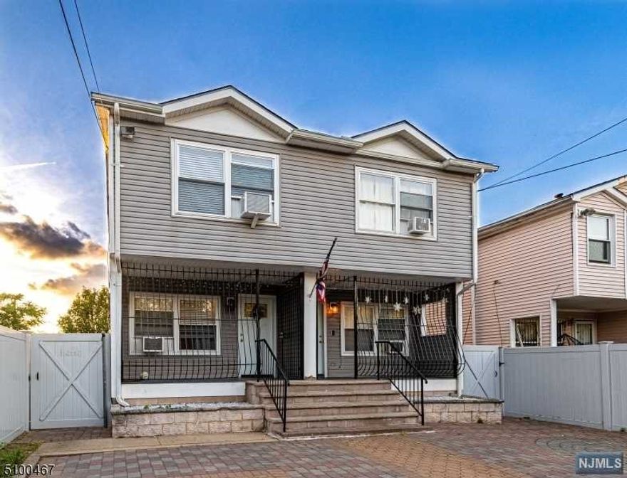 Welcome to your New Home. Renovated 2014. Drive right up to fenced in double paverstone driveway.Both units are identical facing inward on opposite sides.Bamboo Flooring thru the home.Bi-Level living. East Facing home provides ample lighting pouring into spacious LR throughout the day.1st Level equipped with E/I Kit. S/S hardware ,S/S appliances including electric touch stove accompanied with matching microwave and refrigerator. Direct Access to large back yard with storage shed & 1 half bath.2nd Unit (Right Side) includes LG Stackable washer/dryer . 2nd Level has 3 bedrooms each with closet space. 1 full bath & Electric heating throughout the home. Easy access to major highways, light rail, public transportation and a short distance to local grocery store.