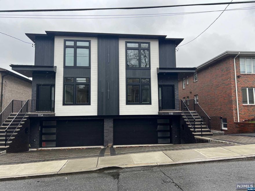 Designed & built new luxury two oversized duplex - unit A and B. Each Unit has 3 bedrooms and 3 1/2 baths, and a 2 car garage. Each floor has high ceilings. The kitchen, dining room , and walk out terrace are all high quality custom designed. The 2nd floor has a Master BR walk-in closet, Master bath, 2 large BR, Main full bath, W/D, Radian floor heat through 1 fl and 2nd fl. Dual zone HVAC. Total 2,400 GAL of stormwater chamber installed at the backyard . The home is located in a convenient location.