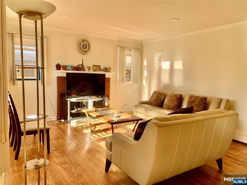 Photo of 113 E Cedar Lane, Teaneck, NJ 07666 (MLS # 25043433)