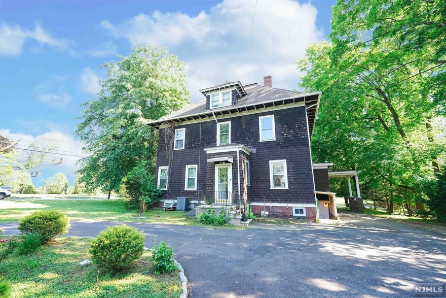 Come and See this rare multifamily investment opportunity in the heart of Ridgewood! Live in one unit and have the other two tenants pay your mortgage or rent out all three and collect income! This rare 3 family property sits on over half an acre and has endless possibilities. The owner currently lives in Unit 1, Unit 2 is vacant & Unit 3 has a tenant. Unit 1 features 2 bedrooms, eat in kitchen, bathroom, large living room, large dining room & family room. The family room can be converted back into a third bedroom. Unit 2 features 3 bedrooms, 1 bathroom, living room/dining room. Unit 3 features one bedroom & one bathroom, kitchen & living room. Property has a large unfinished basement which you can also access from outside. Significant rent increases can be available through renovation on top of high cash on cash yield in place for a family seeking a rental income offset or investor. Close to NYC transit, local shops, schools, and parks. Don't miss this opportunity