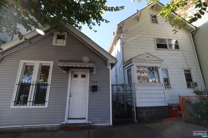 Great Opportunity to own side by side detached 2 family home in Orange. Unit 1 is 2 levels, 4 bedrooms, 1 bath, eat in kitchen, use of private yard. Unit 2 is 1 level, 1 bedroom, 1 bath, eat in kitchen, use of private yard.