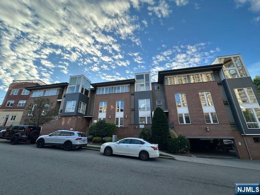 Available 08/15/2026. Modern Spacious 2 bedroom, 2 Bathroom condo with open airy layout, high ceilings, floor to ceiling designer windows and hardwood floors throughout. Immaculate and freshly painted. Modern kitchen, granite countertops, new stove, new dishwasher. Washer & Dryer in unit. The Primary Suite offers 2 designer closets, and a private bathroom. The condo has 2 parking spots in a closed private garage for 3 units with garage opener. Backyard access from Garage. Close to schools, shopping, restaurants & transportation, East Access to NYC bus.
