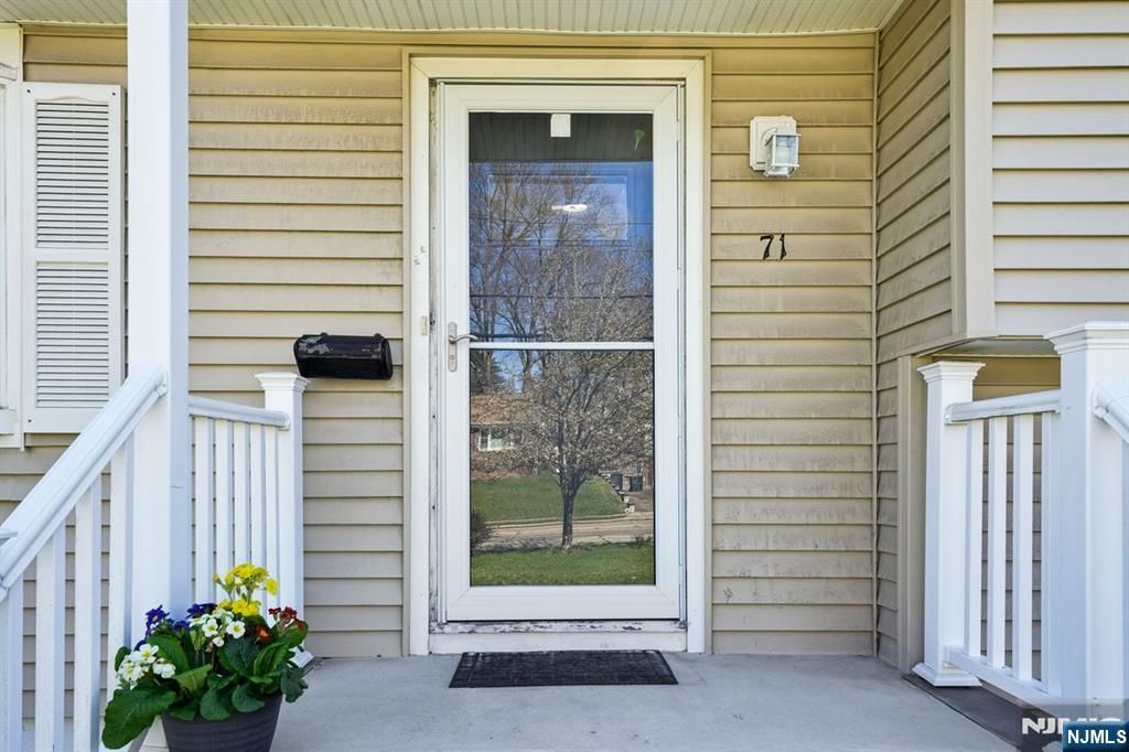 Photo of 71 Ridge Road, Cedar Grove, NJ 07009 (MLS # 26011170)