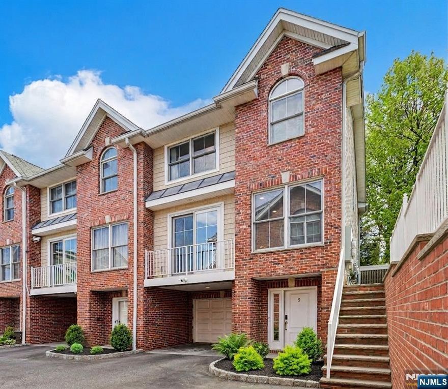 Welcome to this rarely available end-unit townhome offering over 1,700 SF of living space with 3 bedrooms & 3.5 baths in the heart of Palisades Park. Perfectly positioned on a quiet residential street in the most private corner of the community, this home offers the ideal balance of comfort, convenience & modern living. Enter the inviting foyer adjacent to the 1-car garageâ€”perfect for a mudroom setup with coat closet. A large office/den or guest suite with full bath is tucked at the rear for optimal privacy. The bright & spacious main level showcases an expanded open-concept living/dining area that flows seamlessly into the updated kitchen, with sliding glass doors to the paver patio. Oversized windows throughout the corner unit bring in abundant natural light, accentuating the beautiful hardwood floors & thoughtful design. On the upper level, the primary suite offers a relaxing retreat with a private bath & ample closet space. Two additional bedrooms are generously sized and share a hallway bath, along with a conveniently located laundry area. Every detail reflects pride of ownership & easy, low-maintenance living while the multi-level layout provides flexibility. Enjoy the unbeatable convenience of nearby shopping, dining, parks, and NYC transportationâ€”making this home ideal for anyone seeking a vibrant suburb with city accessibility. Whether youâ€™re a 1st-time buyer, downsizing, or looking for a smart investment, this is a wonderful opportunity! OFFERS DUE WED 4/29.